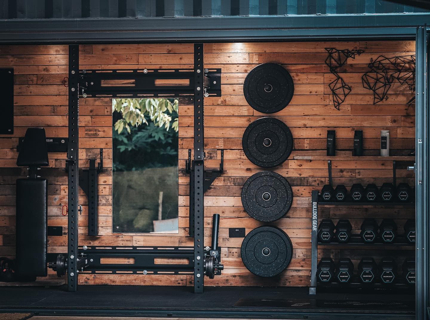 Bulldog Gear rig and dumbbell rack inside the Yard Fitness studio